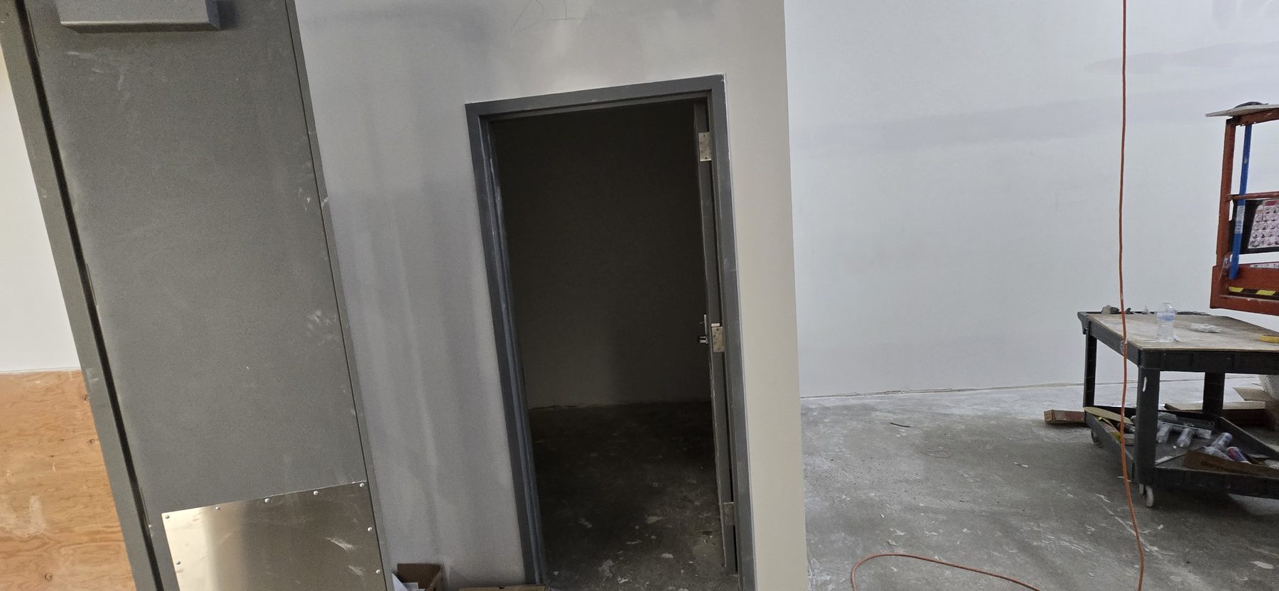 Commercial drywall door frame finishing and wall prep by Finishing Touch, LLC in St. Paul, MN