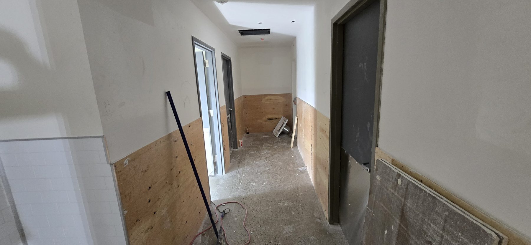 Commercial drywall hallway repair and finishing by Finishing Touch, LLC in St. Paul, MN