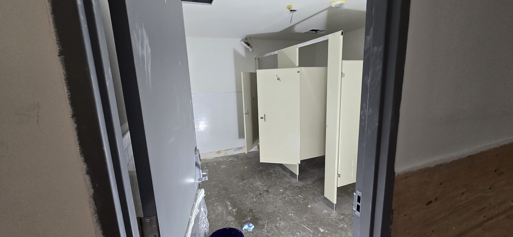 Commercial restroom drywall finish and repair by Finishing Touch, LLC in St. Paul, MN