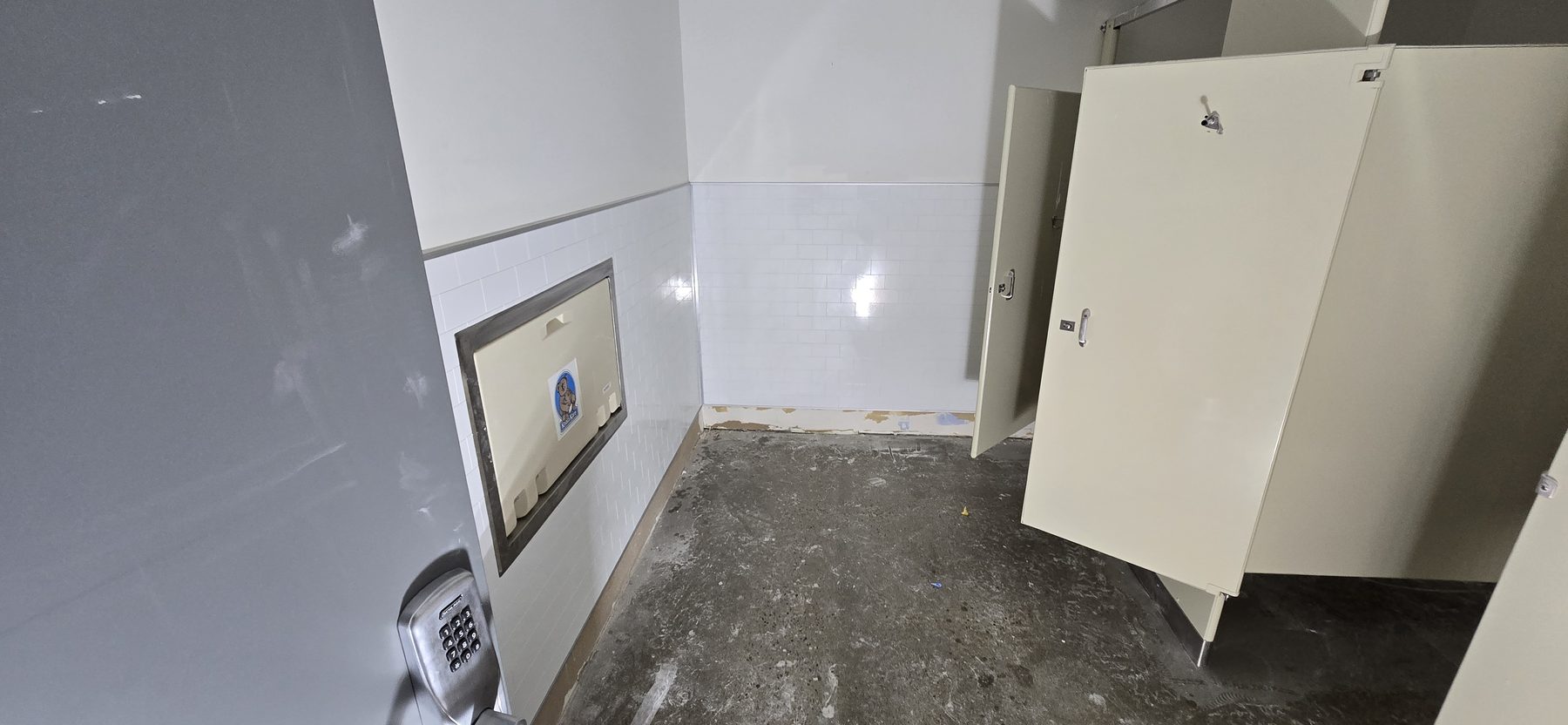 Commercial restroom drywall renovation and wall finish by Finishing Touch, LLC in St. Paul, MN